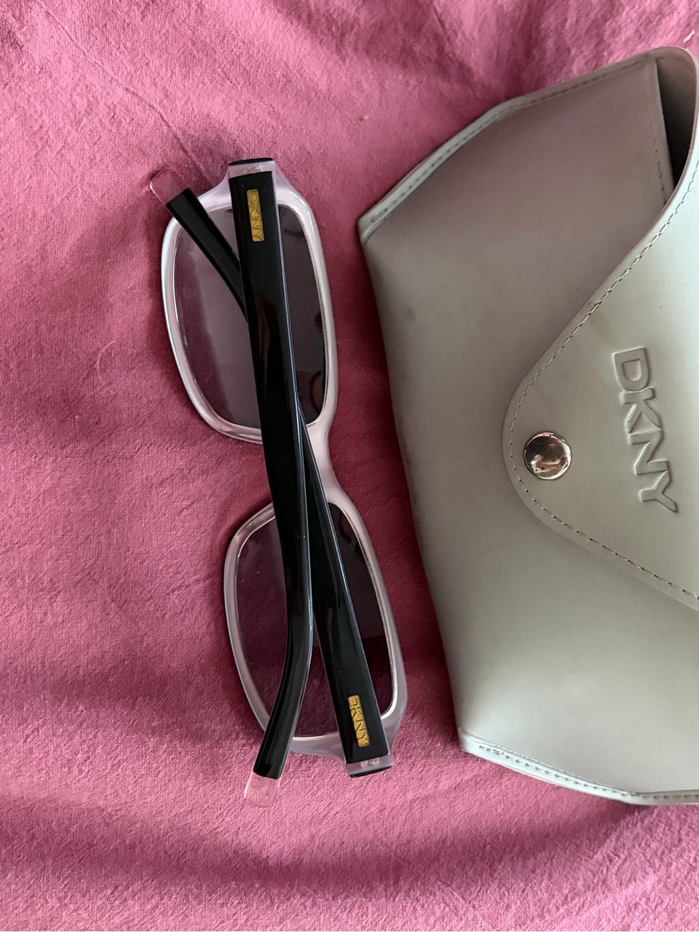 DKNY Pink Frame Sunglasses with Black Temples and Cream Case